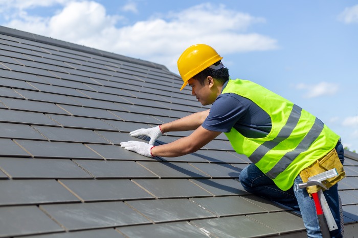 The team from Cunningham Contracting, Inc. is working on a commercial roof in Annapolis, MD