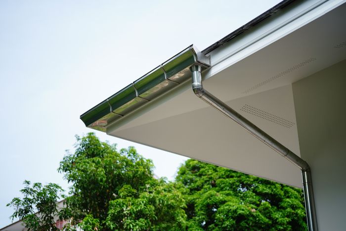 Aluminum gutter being installed on a home by Cunningham Contracting in the Greater Annapolis Area